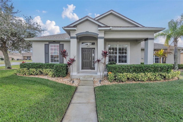 view of front of home featuring a front lawn