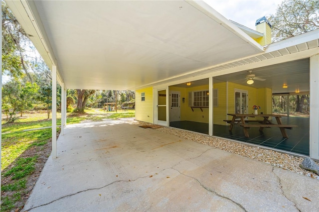 view of patio / terrace featuring french doors and ceiling fan