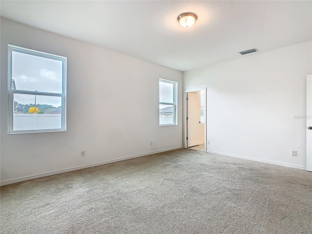 view of carpeted spare room