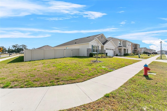 view of home's exterior featuring a yard and a garage