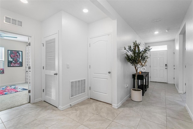 view of tiled foyer entrance