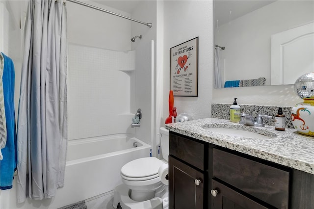 full bath featuring toilet, shower / bath combo, and vanity