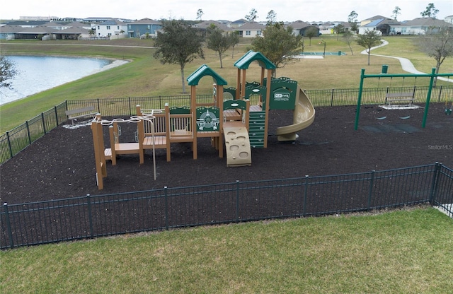 community play area with a residential view, a water view, a lawn, and fence