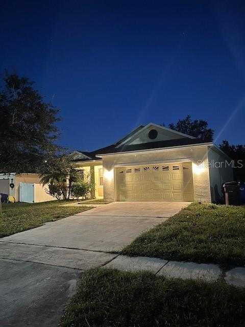 ranch-style home with a garage