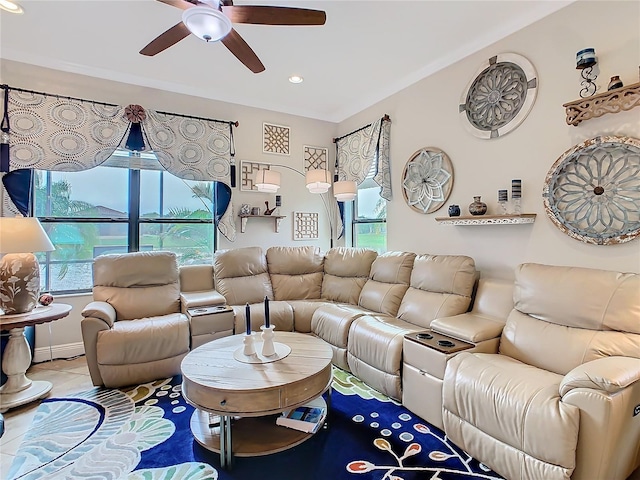 tiled living room with ceiling fan and lofted ceiling