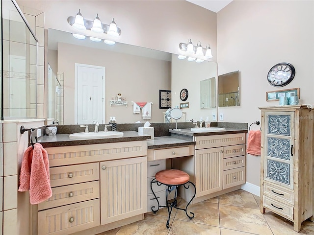 bathroom with tile patterned floors and vanity