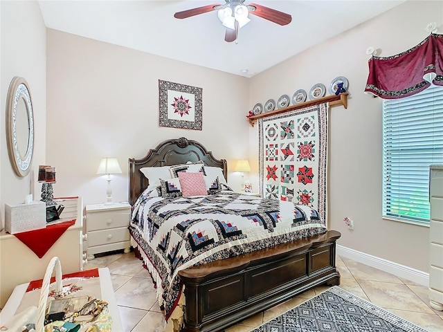 tiled bedroom with ceiling fan