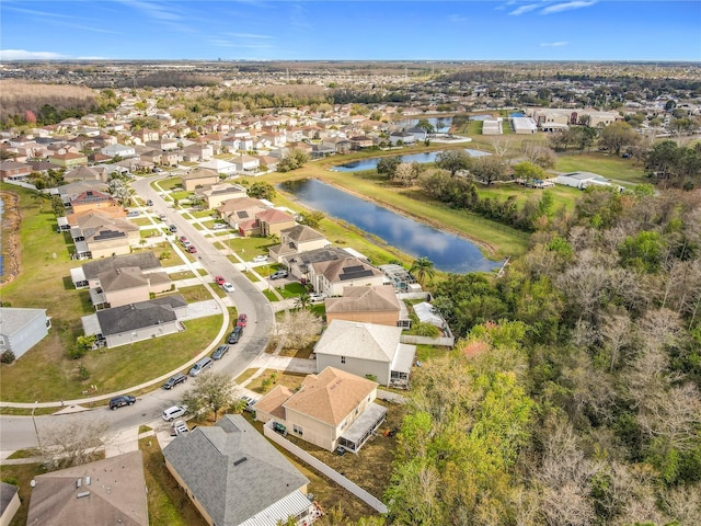 aerial view with a residential view and a water view