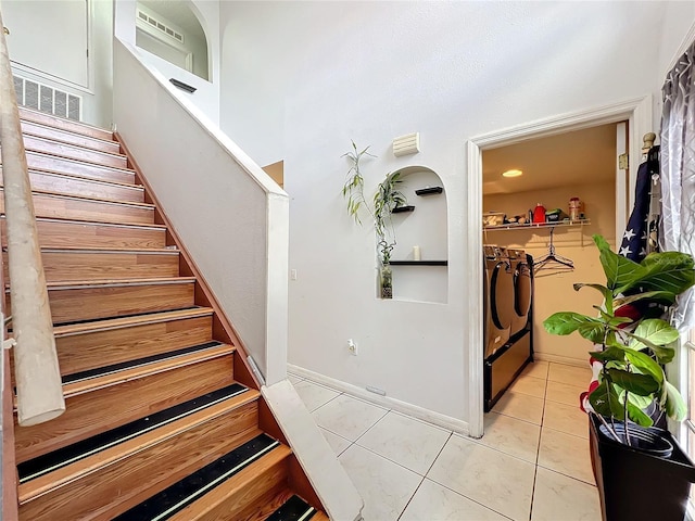 10409 Laxton St, Orlando, FL 32824 - stairway with tile patterned floors