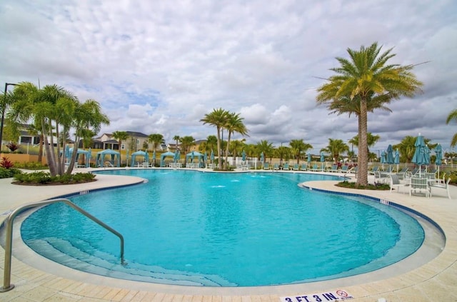 view of pool featuring a patio area