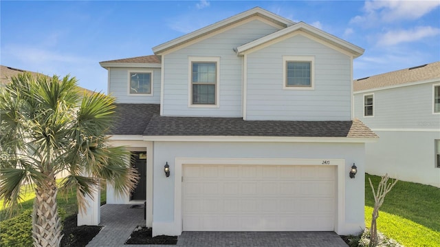 view of front of home with a garage