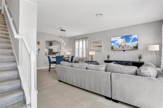 living room featuring light tile patterned floors