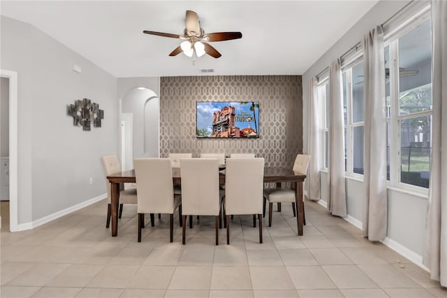 dining space with ceiling fan