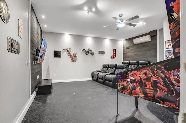 cinema with wooden walls, an AC wall unit, and ceiling fan