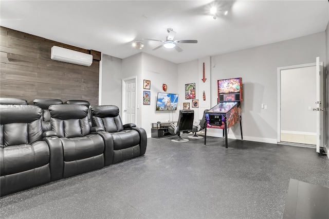 home theater room featuring ceiling fan, a wall mounted air conditioner, and wooden walls