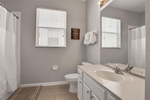 bathroom featuring a shower with curtain, vanity, tile patterned floors, and toilet