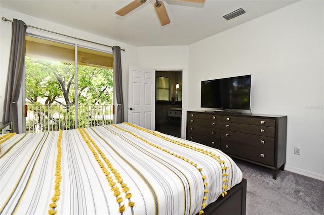 8766 The Esplanade Unit 23, Orlando, FL 32836 - carpeted bedroom featuring baseboards, ceiling fan, and visible vents
