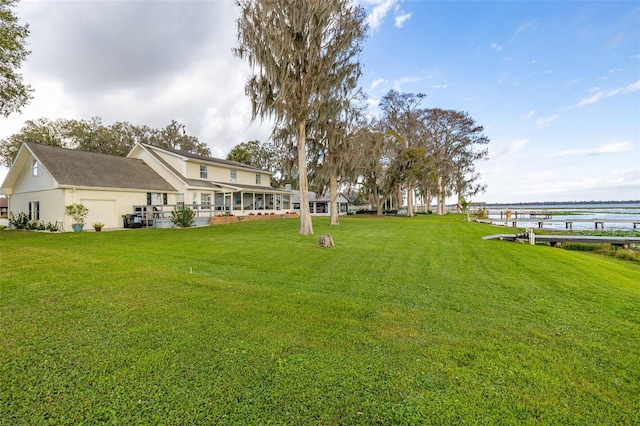 view of yard with a water view