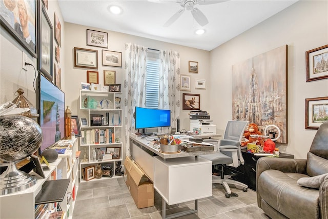 office area with ceiling fan and light tile patterned floors