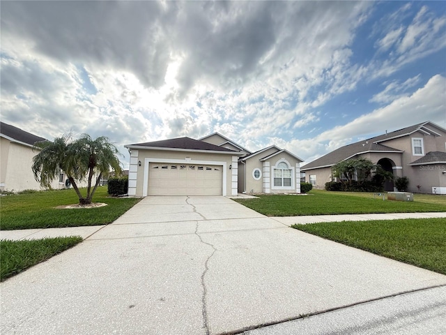 ranch-style home with a garage and a front yard