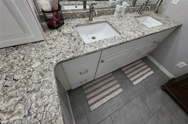 bathroom featuring tile patterned floors and vanity