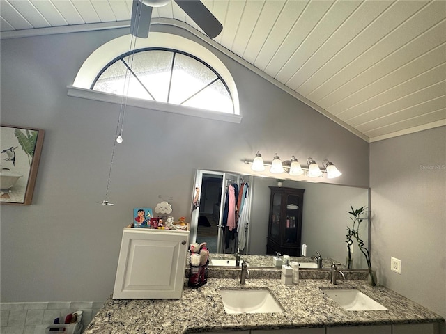 bathroom with vaulted ceiling, ceiling fan, wooden ceiling, and vanity