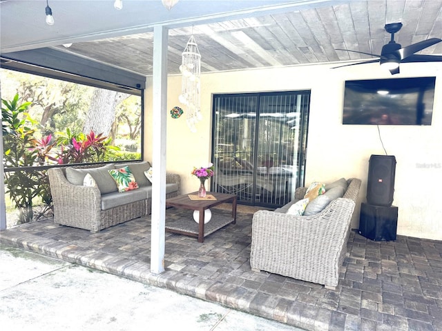 view of patio with ceiling fan and outdoor lounge area