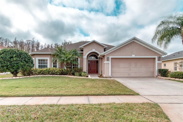 single story home with a garage and a front yard