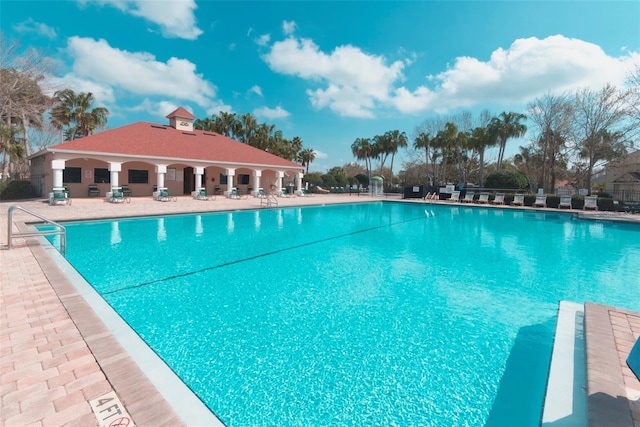 view of pool featuring a patio area