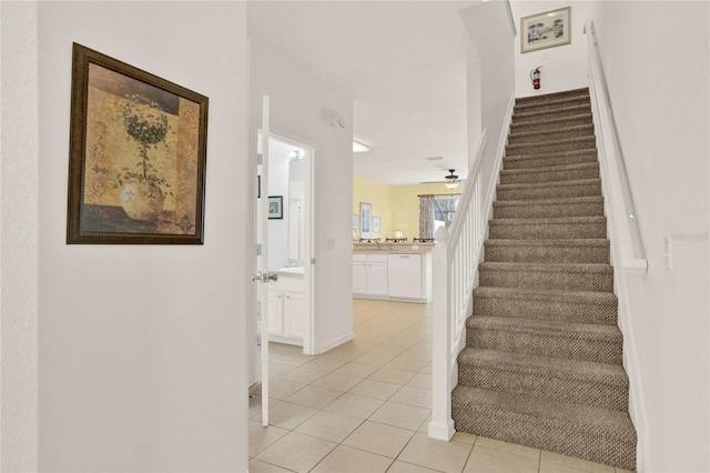 staircase with tile patterned flooring