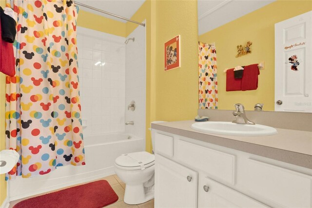 bathroom with vanity, shower / bath combo, tile patterned flooring, and toilet