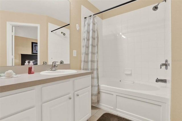 bathroom with shower / bathtub combination with curtain, vanity, and tile patterned floors