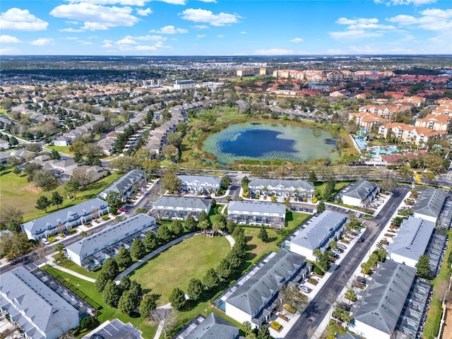 birds eye view of property featuring a residential view and a water view