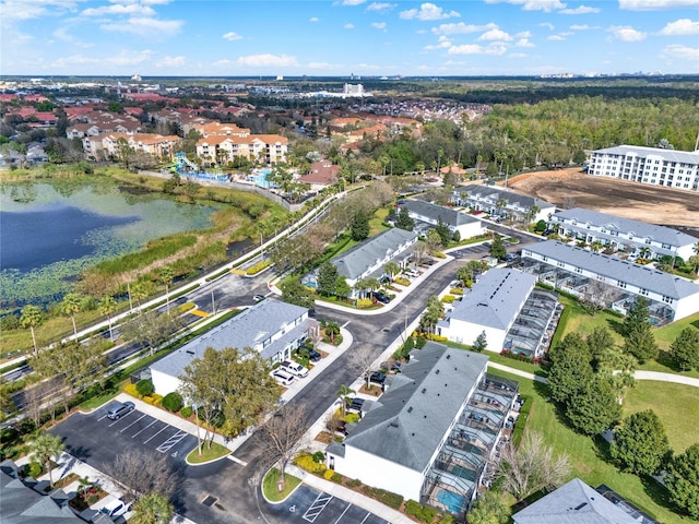 aerial view featuring a water view and a residential view