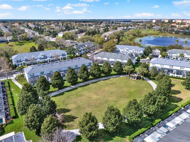 aerial view with a water view and a residential view