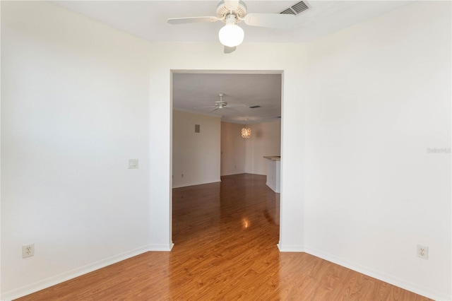 corridor featuring hardwood / wood-style floors