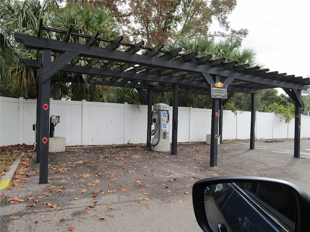 view of parking with water heater