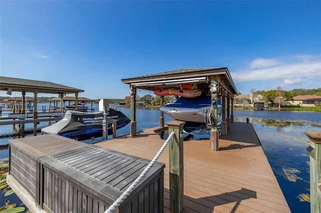 view of dock with a water view