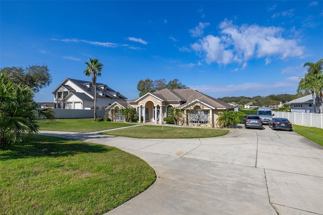 view of front of property with a front lawn