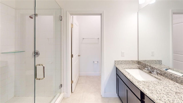452 Diamond Dove Cv, Winter Springs, FL 32708 - bathroom featuring tile patterned floors, vanity, and an enclosed shower
