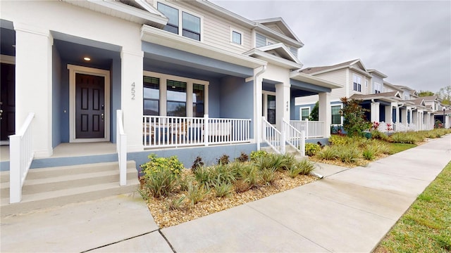 452 Diamond Dove Cv, Winter Springs, FL 32708 - view of front of property featuring covered porch