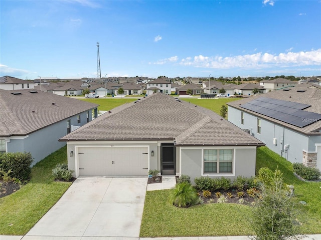 single story home with concrete driveway, a shingled roof, a front yard, a residential view, and a garage