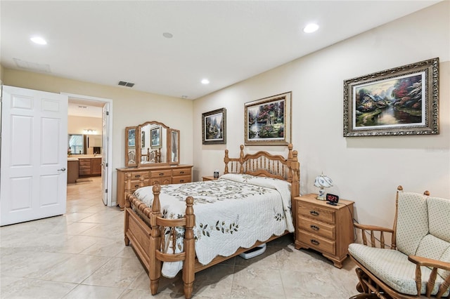 bedroom with ensuite bath