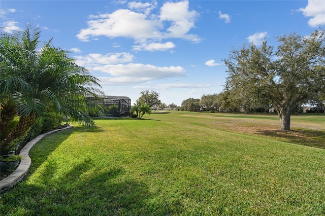 view of yard featuring a lanai