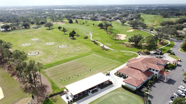 bird's eye view with view of golf course