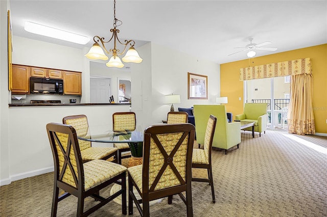 8100 Poinciana Blvd Unit 2501, Orlando, FL 32821 - dining room with light carpet, ceiling fan, and baseboards