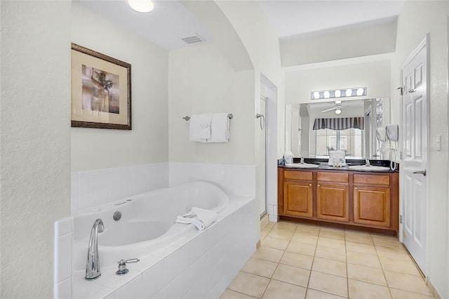 8100 Poinciana Blvd Unit 2501, Orlando, FL 32821 - full bath featuring double vanity, visible vents, a sink, tile patterned flooring, and a bath