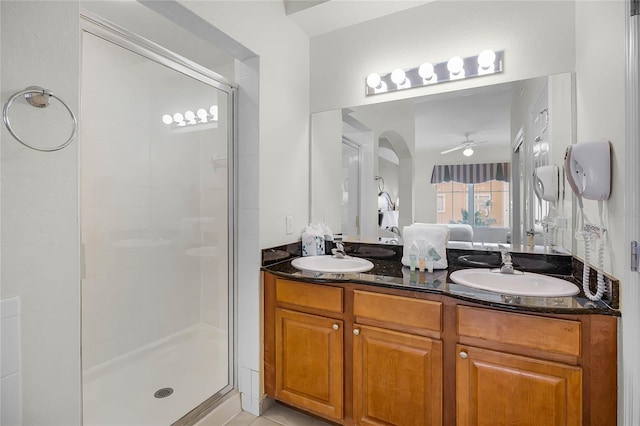 8100 Poinciana Blvd Unit 2501, Orlando, FL 32821 - ensuite bathroom with double vanity, a stall shower, a sink, and connected bathroom