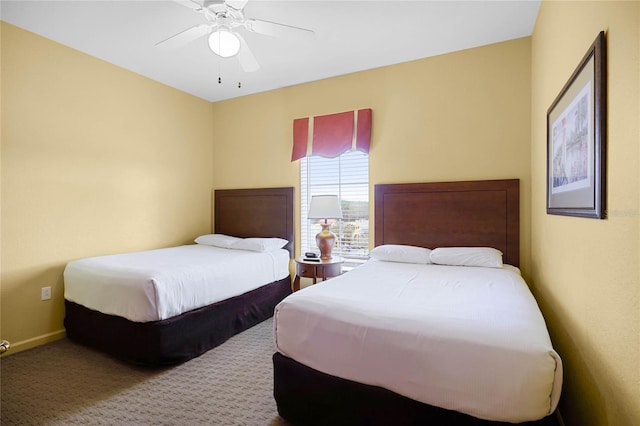 8100 Poinciana Blvd Unit 2501, Orlando, FL 32821 - bedroom featuring baseboards, a ceiling fan, and carpet flooring