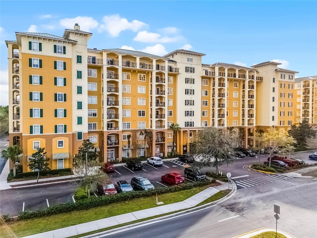 8100 Poinciana Blvd Unit 2501, Orlando, FL 32821 - view of building exterior with uncovered parking